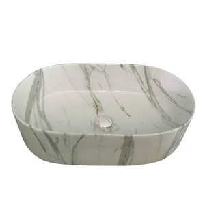 כיור מונח אובלי בלבן שיש