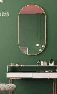 מראה אובלית 60X80 ס"מ מסגרת זהב פורום